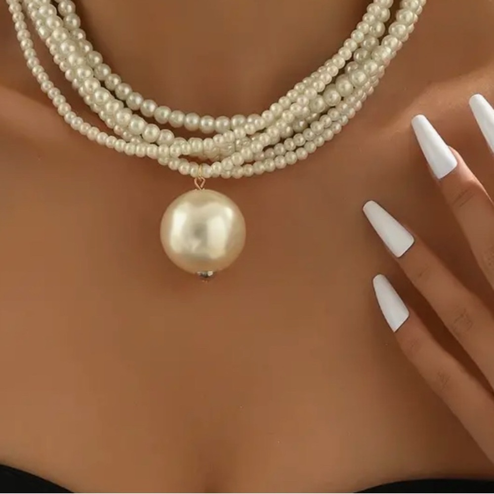 - A Luxurious Multi-Layer Bead‎ Necklace for Women, Perfect for any Occasion